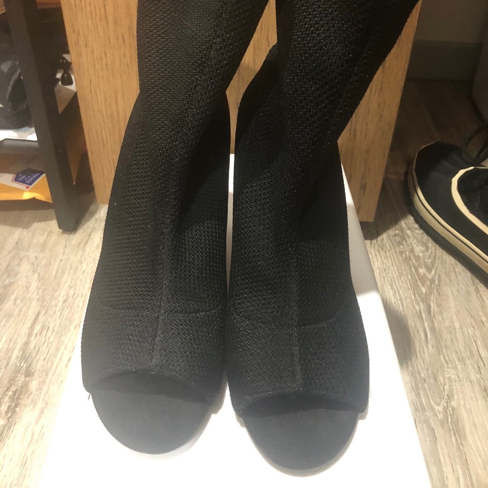 Stiletto peek a boo “sock” heels.
